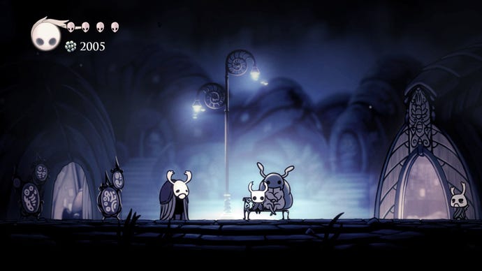 A bug sits on a bench chatting to another bug in Hollow Knight